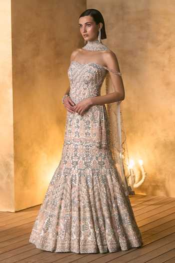 Shop Angad Singh Ivory Net Sweetheart Neck Aurore Embroidered Fish Cut Lehenga Set Online at Aza Fashions Shop_Angad Singh_Ivory Net Sweetheart Neck Aurore Embroidered Fish Cut Lehenga Set _Online_at_Aza_Fashions