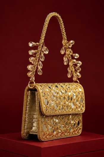 House Of Kosha Gold Ira Mirrorwork Embellished Mini Bag Online at Aza Fashions House Of Kosha_Gold Ira Mirrorwork Embellished Mini Bag _Online_at_Aza_Fashions
