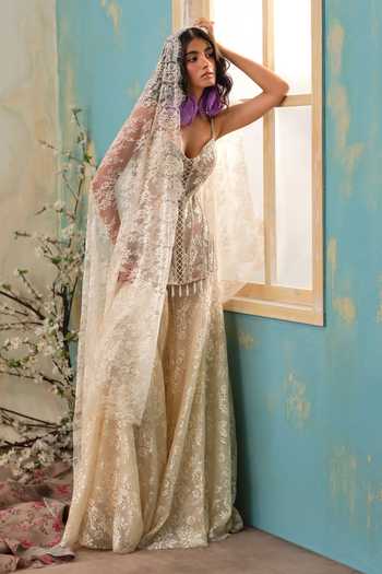Shop Shehlaa Khan Cream Lace Sweetheart Neck, Yes Embellished Kurta Sharara Set at Aza Fashions Shop_Shehlaa Khan_Cream Lace Sweetheart Neck, Yes Embellished Kurta Sharara Set _at_Aza_Fashions