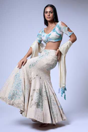 Buy Vrinda Soni Ivory Crepe, Tulle, Tissue Sweetheart Grain Embellished Fish Tail Lehenga Set Online at Aza Fashions Buy_Vrinda Soni_Ivory Crepe, Tulle, Tissue Sweetheart Grain Embellished Fish Tail Lehenga Set _Online_at_Aza_Fashions