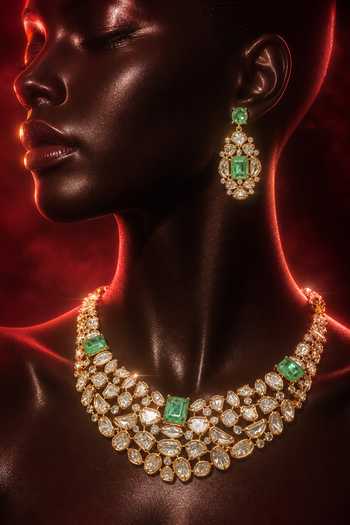 Tussya Gold Plated Kundan Embellished Necklace And Earrings Set Online at Aza Fashions Tussya_Gold Plated Kundan Embellished Necklace And Earrings Set _Online_at_Aza_Fashions