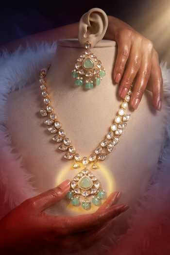 Tussya Gold Plated Kundan Studded Necklace And Earrings Set Online at Aza Fashions Tussya_Gold Plated Kundan Studded Necklace And Earrings Set _Online_at_Aza_Fashions