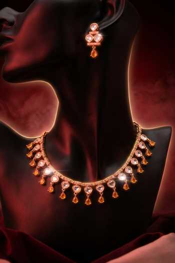 Tussya Gold Plated Stone Embellished Necklace Set at Aza Fashions Tussya_Gold Plated Stone Embellished Necklace Set _at_Aza_Fashions