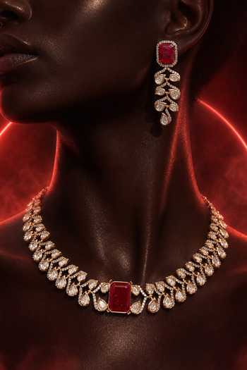 Shop Tussya Gold Plated Kundan Embellished Necklace And Earrings Set Online at Aza Fashions Shop_Tussya_Gold Plated Kundan Embellished Necklace And Earrings Set _Online_at_Aza_Fashions