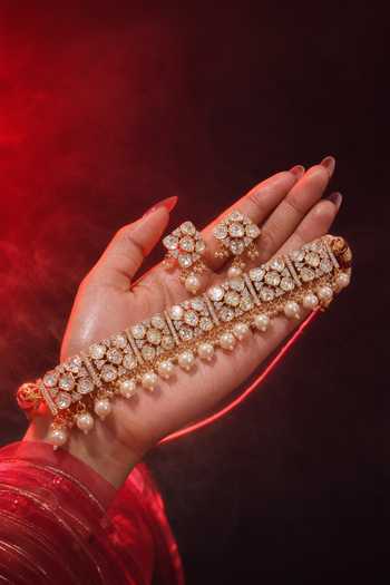 Tussya Gold Plated Kundan Embellished Necklace And Earrings Set Online at Aza Fashions Tussya_Gold Plated Kundan Embellished Necklace And Earrings Set _Online_at_Aza_Fashions