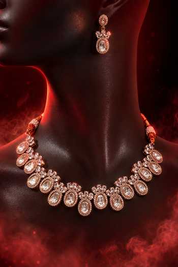 Tussya Gold Plated Kundan Embellished Necklace And Earrings Set Online at Aza Fashions Tussya_Gold Plated Kundan Embellished Necklace And Earrings Set _Online_at_Aza_Fashions