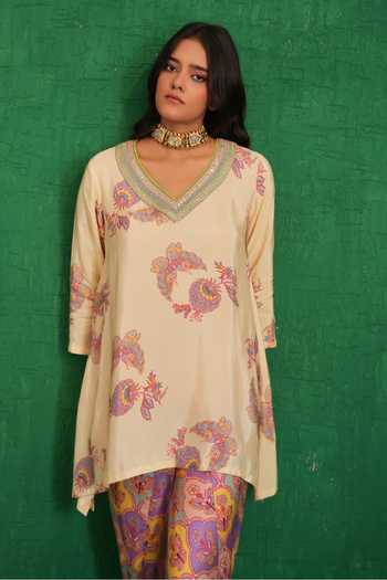 Swati Vijaivargie Ivory Silk, Satin, Modal V-neck Buta Jaal Short Kurta And Dhoti Pant Set at Aza Fashions Swati Vijaivargie_Ivory Silk, Satin, Modal V-neck Buta Jaal Short Kurta And Dhoti Pant Set _at_Aza_Fashions