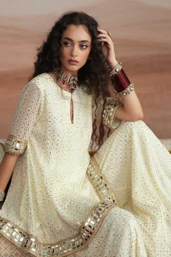 Buy_Mustard Moon By Neyha And Vrinda_Ivory Georgette Keyhole Neck Mishka Flared Short Kurta Sharara Set 