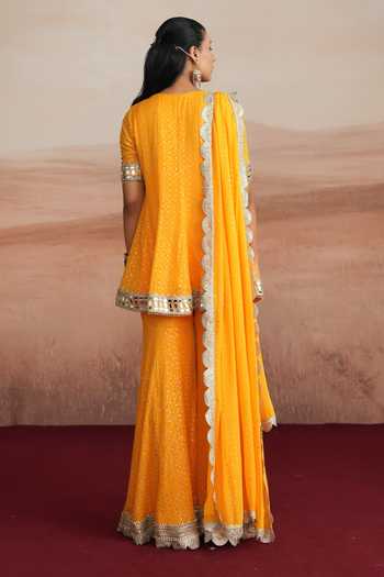 Mustard Moon By Neyha And Vrinda Mishka Flared Short Kurta Sharara Set