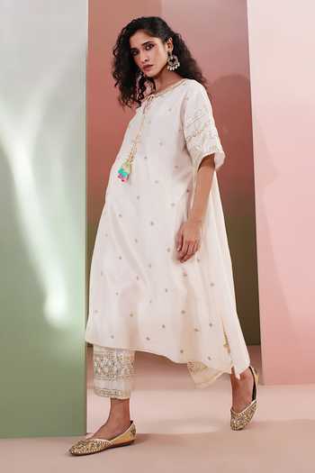 Buy Priyanka Jain Ivory Chanderi Sequins Round Neck Aafreen Embroidered Kaftan And Palazzo Set Online at Aza Fashions Buy_Priyanka Jain_Ivory Chanderi Sequins Round Neck Aafreen Embroidered Kaftan And Palazzo Set _Online_at_Aza_Fashions