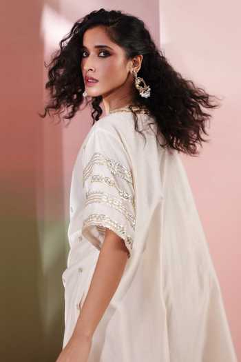 Priyanka Jain Ivory Chanderi Sequins Round Neck Aafreen Embroidered Kaftan And Palazzo Set at Aza Fashions Priyanka Jain_Ivory Chanderi Sequins Round Neck Aafreen Embroidered Kaftan And Palazzo Set _at_Aza_Fashions