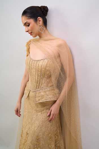 Shop Tarun Tahiliani Gold Embroidery, Sequins, Zari, Stones Bandeau Neck Pre-draped Lehenga Saree Set Online at Aza Fashions Shop_Tarun Tahiliani_Gold Embroidery, Sequins, Zari, Stones Bandeau Neck Pre-draped Lehenga Saree Set _Online_at_Aza_Fashions