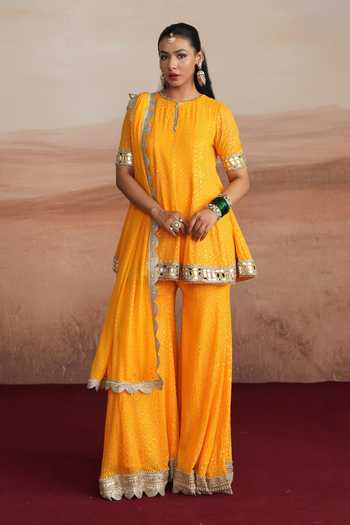 Mustard Moon By Neyha And Vrinda Mishka Flared Short Kurta Sharara Set