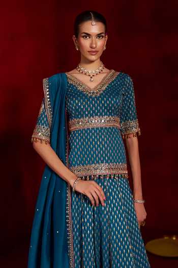 Hirika & Dhruti Blue Georgette, Silk, Organza V-neck Mirror Work Blouse Lehenga Set at Aza Fashions Hirika & Dhruti_Blue Georgette, Silk, Organza V-neck Mirror Work Blouse Lehenga Set _at_Aza_Fashions