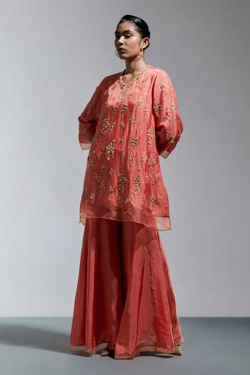 Buy One Not Two Peach Silk Round Neck Hand Embroidered Kurta And Sharara Set Online at Aza Fashions Buy_One Not Two_Peach Silk Round Neck Hand Embroidered Kurta And Sharara Set _Online_at_Aza_Fashions