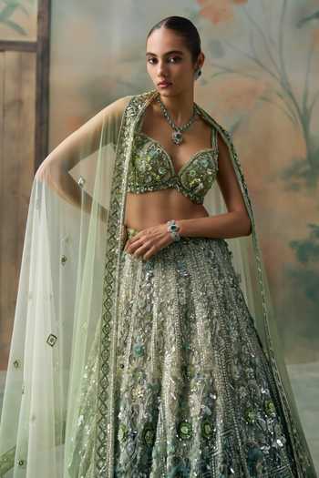 Opus Atelier Green Net Sweetheart Neck Sequin Embroidered Lehenga Set Online at Aza Fashions Opus Atelier_Green Net Sweetheart Neck Sequin Embroidered Lehenga Set _Online_at_Aza_Fashions