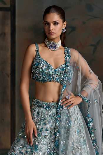 Opus Atelier Blue Net Sweetheart Neck Floral Applique Work Lehenga Set at Aza Fashions Opus Atelier_Blue Net Sweetheart Neck Floral Applique Work Lehenga Set _at_Aza_Fashions