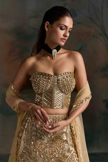 Opus Atelier Gold Net, Silk Sweetheart Neck Embroidered Corset Lehenga Set Online at Aza Fashions Opus Atelier_Gold Net, Silk Sweetheart Neck Embroidered Corset Lehenga Set _Online_at_Aza_Fashions