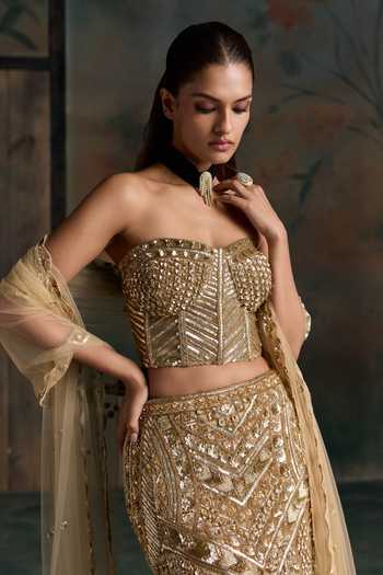 Buy Opus Atelier Gold Net, Silk Sweetheart Neck Embroidered Corset Lehenga Set Online at Aza Fashions Buy_Opus Atelier_Gold Net, Silk Sweetheart Neck Embroidered Corset Lehenga Set _Online_at_Aza_Fashions