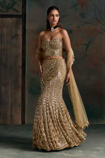 Shop Opus Atelier Gold Net, Silk Sweetheart Neck Embroidered Corset Lehenga Set Online at Aza Fashions Shop_Opus Atelier_Gold Net, Silk Sweetheart Neck Embroidered Corset Lehenga Set _Online_at_Aza_Fashions