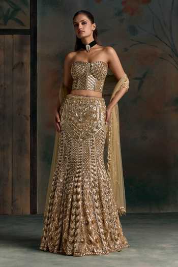 Opus Atelier Gold Net, Silk Sweetheart Neck Embroidered Corset Lehenga Set at Aza Fashions Opus Atelier_Gold Net, Silk Sweetheart Neck Embroidered Corset Lehenga Set _at_Aza_Fashions