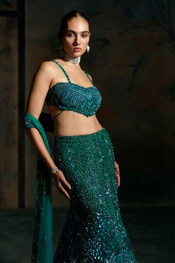 Shop Opus Atelier Green Net, Lycra Sweetheart Neck Sequin Embellished Lehenga Set Online at Aza Fashions Shop_Opus Atelier_Green Net, Lycra Sweetheart Neck Sequin Embellished Lehenga Set _Online_at_Aza_Fashions