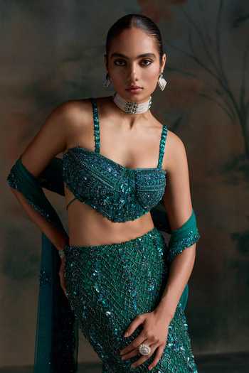 Opus Atelier Green Net, Lycra Sweetheart Neck Sequin Embellished Lehenga Set at Aza Fashions Opus Atelier_Green Net, Lycra Sweetheart Neck Sequin Embellished Lehenga Set _at_Aza_Fashions