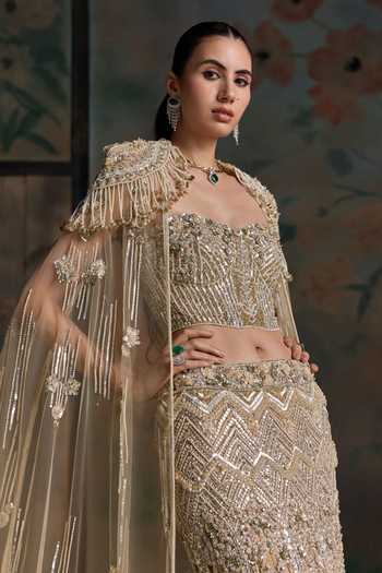 Shop Opus Atelier Multi Color Net, Lycra Sweetheart Neck Embellished Cape Lehenga Set Shop_Opus Atelier_Multi Color Net, Lycra Sweetheart Neck Embellished Cape Lehenga Set