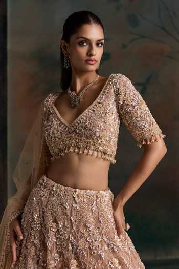 Opus Atelier Peach Silk, Net V-neck Sequin Work Lehenga Set at Aza Fashions Opus Atelier_Peach Silk, Net V-neck Sequin Work Lehenga Set _at_Aza_Fashions