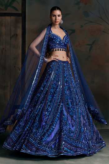 Opus Atelier Blue Net, Silk Sweetheart Neck Embroidered Lehenga Set at Aza Fashions Opus Atelier_Blue Net, Silk Sweetheart Neck Embroidered Lehenga Set _at_Aza_Fashions