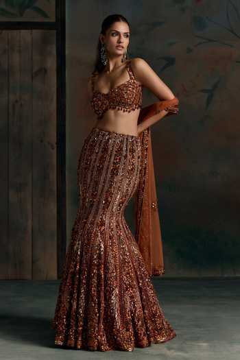 Opus Atelier Orange Net, Lycra Sweetheart Neck Crystal Embellished Lehenga Set at Aza Fashions Opus Atelier_Orange Net, Lycra Sweetheart Neck Crystal Embellished Lehenga Set _at_Aza_Fashions