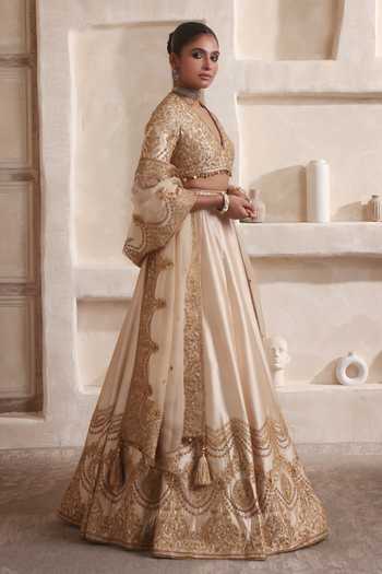 Buy Label Niti Bothra Beige Silk, Organza Embroidery, Zari, Tassels Zar-rang Ivory Scallop Lehenga Set Buy_Label Niti Bothra_Beige Silk, Organza Embroidery, Zari, Tassels Zar-rang Ivory Scallop Lehenga Set