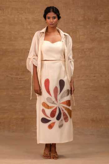 Shop Eeda Ivory Silk, Tissue, Shantoon Collared Neck, Pleated Shirt And Applique Skirt Set Online at Aza Fashions Shop_Eeda_Ivory Silk, Tissue, Shantoon Collared Neck, Pleated Shirt And Applique Skirt Set _Online_at_Aza_Fashions