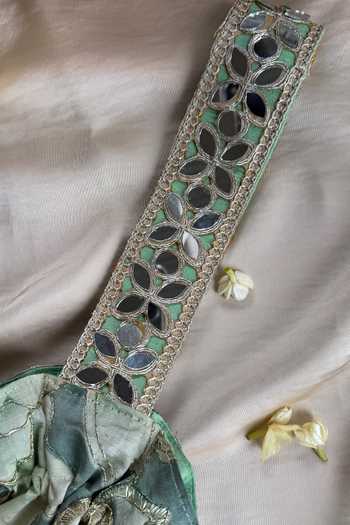 Quirky Tales_Green Embroidery, Mirrors, Tassels Floral Work Silk Potli _at_Aza_Fashions