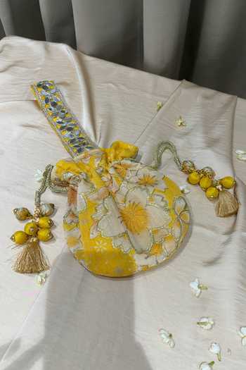 Buy Quirky Tales Yellow Embroidery, Mirrors, Tassels Floral Work Strap Potli Online at Aza Fashions Buy_Quirky Tales_Yellow Embroidery, Mirrors, Tassels Floral Work Strap Potli _Online_at_Aza_Fashions