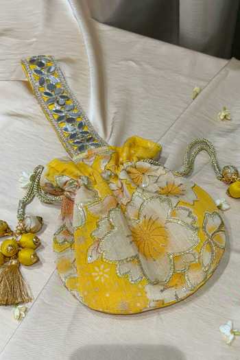Shop Quirky Tales Yellow Embroidery, Mirrors, Tassels Floral Work Strap Potli Online at Aza Fashions Shop_Quirky Tales_Yellow Embroidery, Mirrors, Tassels Floral Work Strap Potli _Online_at_Aza_Fashions