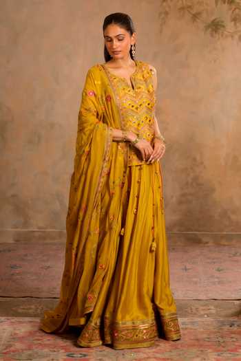 Buy Studio Bagechaa Mustard Silk, Cotton, Organza V-neck Kiran Embroidered Kurta Lehenga Set Online at Aza Fashions Buy_Studio Bagechaa_Mustard Silk, Cotton, Organza V-neck Kiran Embroidered Kurta Lehenga Set _Online_at_Aza_Fashions