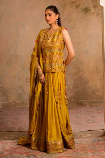 Shop Studio Bagechaa Mustard Silk, Cotton, Organza V-neck Kiran Embroidered Kurta Lehenga Set Online at Aza Fashions Shop_Studio Bagechaa_Mustard Silk, Cotton, Organza V-neck Kiran Embroidered Kurta Lehenga Set _Online_at_Aza_Fashions