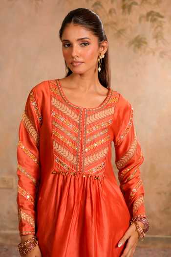 Studio Bagechaa Orange Cotton, Chanderi, Crepe Era Embroidered Peplum Kurta And Dhoti Skirt Set Online at Aza Fashions Studio Bagechaa_Orange Cotton, Chanderi, Crepe Era Embroidered Peplum Kurta And Dhoti Skirt Set _Online_at_Aza_Fashions
