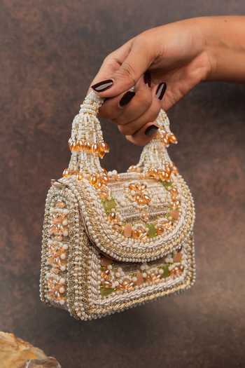 Buy Nayaab By Sonia Gold Empress Charm Clutch Bag Online at Aza Fashions Buy_Nayaab By Sonia_Gold Empress Charm Clutch Bag _Online_at_Aza_Fashions