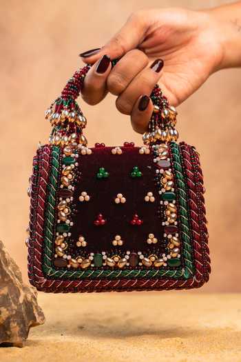 Shop Nayaab By Sonia Maroon Empress Wine Charm Clutch Bag Online at Aza Fashions Shop_Nayaab By Sonia_Maroon Empress Wine Charm Clutch Bag _Online_at_Aza_Fashions