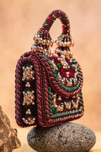 Buy Nayaab By Sonia Maroon Empress Wine Charm Clutch Bag Buy_Nayaab By Sonia_Maroon Empress Wine Charm Clutch Bag