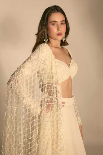 Buy Premya By Manishii Ivory Georgette, Tulle Sweetheart Lehenga Set With Heavy Embroidered Dupatta Buy_Premya By Manishii_Ivory Georgette, Tulle Sweetheart Lehenga Set With Heavy Embroidered Dupatta