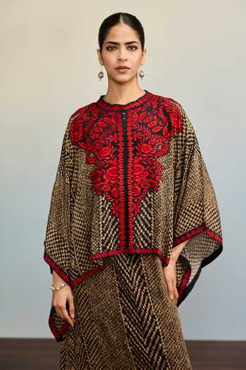 Ritu Kumar_Black Crepe, Rayon Round Neck Druti Floral Print Kaftan And Skirt Co-ord Set _at_Aza_Fashions