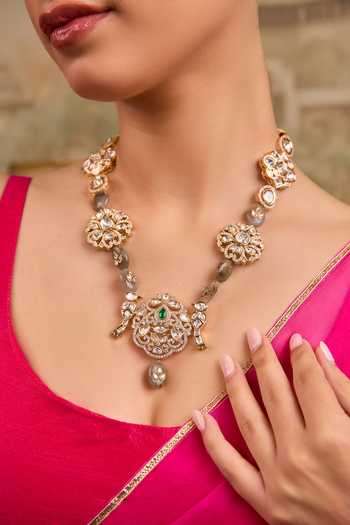 Shop Xago White Stone And Crystal Floral Pendant Necklace Online at Aza Fashions Shop_Xago_White Stone And Crystal Floral Pendant Necklace _Online_at_Aza_Fashions