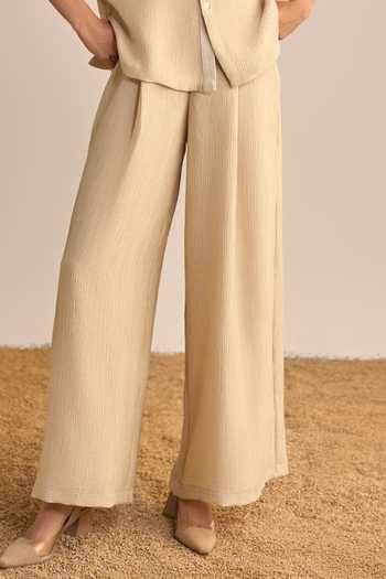 Dash And Dot_Beige Polyester Mandarin Collar Textured Asymmetric Shirt And Palazzo Set _Online_at_Aza_Fashions