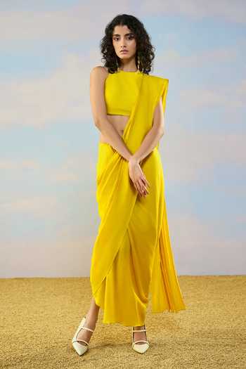 Dash And Dot Yellow Viscose Round Neck Textured Blouse And Draped Skirt Set at Aza Fashions Dash And Dot_Yellow Viscose Round Neck Textured Blouse And Draped Skirt Set _at_Aza_Fashions