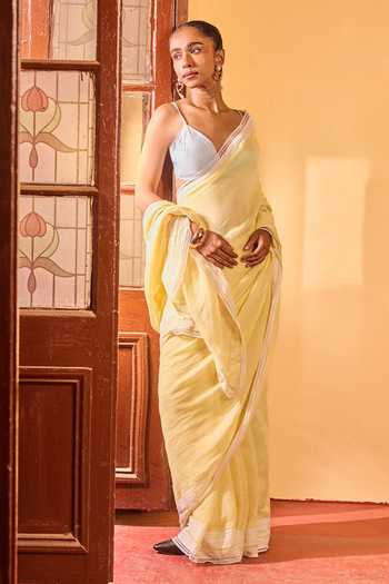 Dressfolk Yellow Linen Handwoven Saree With Unstitched Blouse Piece at Aza Fashions Dressfolk_Yellow Linen Handwoven Saree With Unstitched Blouse Piece _at_Aza_Fashions