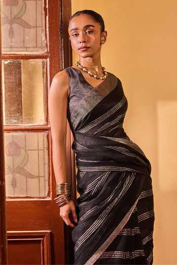 Dressfolk Black Linen Handwoven Striped Saree With Unstitched Blouse at Aza Fashions Dressfolk_Black Linen Handwoven Striped Saree With Unstitched Blouse _at_Aza_Fashions