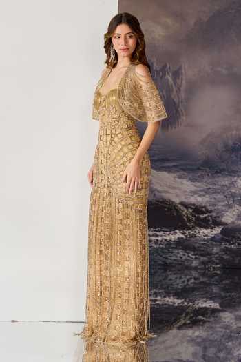 Geisha Designs Gold Viscose, Nylon Sequins, Beads, Fringe Susanna Embellished Gown With Cape Online at Aza Fashions Geisha Designs_Gold Viscose, Nylon Sequins, Beads, Fringe Susanna Embellished Gown With Cape _Online_at_Aza_Fashions